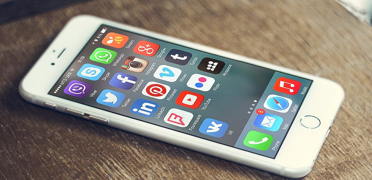 Social media app icons on a smartphone